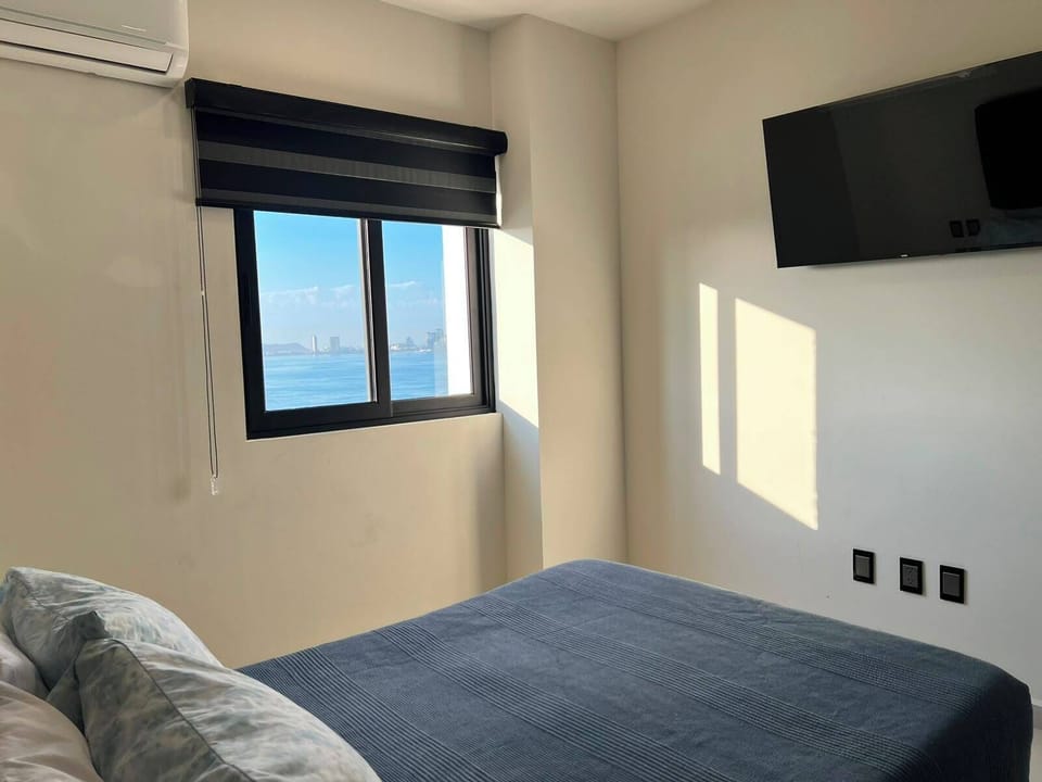 Deluxe Suite, Balcony, Beach View | Premium bedding, down comforters, desk, laptop workspace