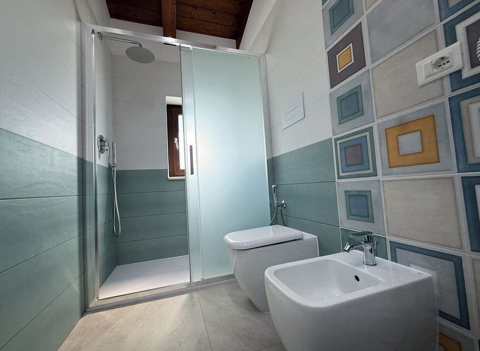 Studio, Garden View | Bathroom | Shower, hair dryer, towels, soap