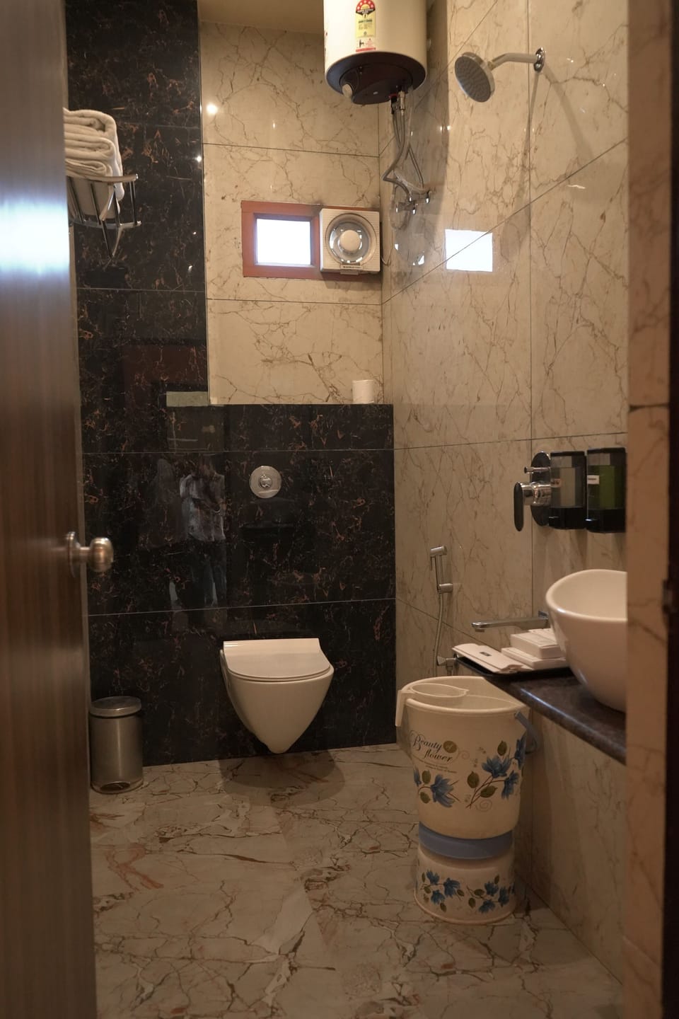 Shower, slippers, towels, soap