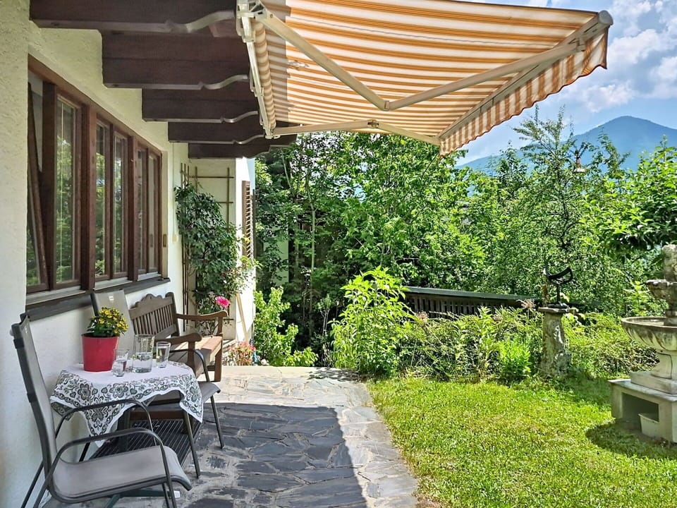 Awning, Furniture, Shade, Outdoor Furniture, Outdoor Table, Chair, Outdoor Structure, Flowerpot, Balcony, Houseplant