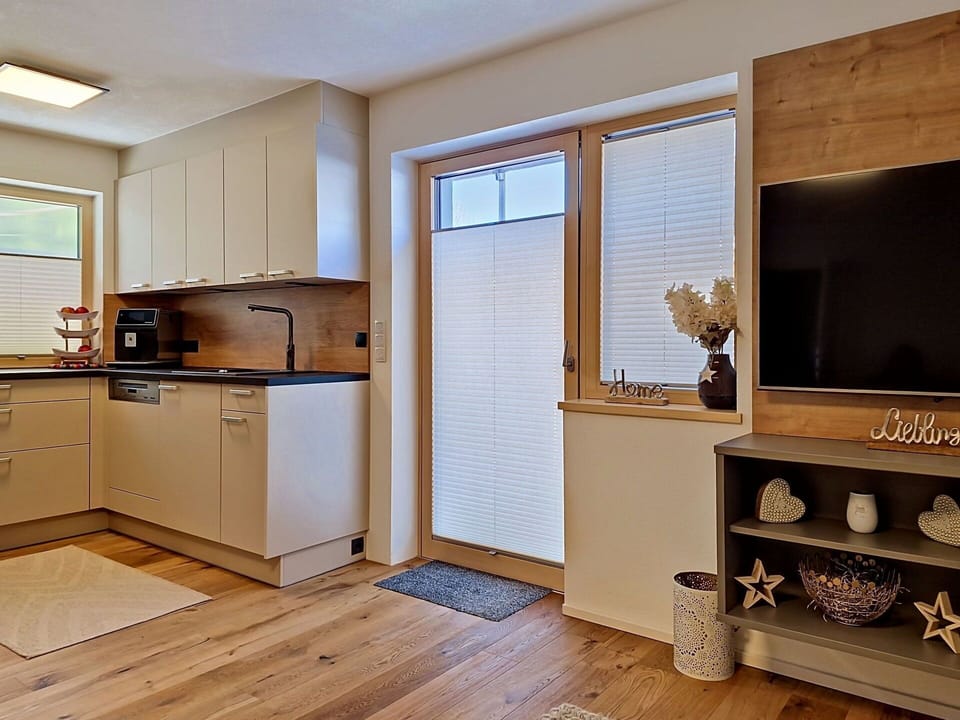Furniture, Interior Design, Flooring, Wall, Floor, Wood, Ceiling, Room, Lighting, Cabinetry
