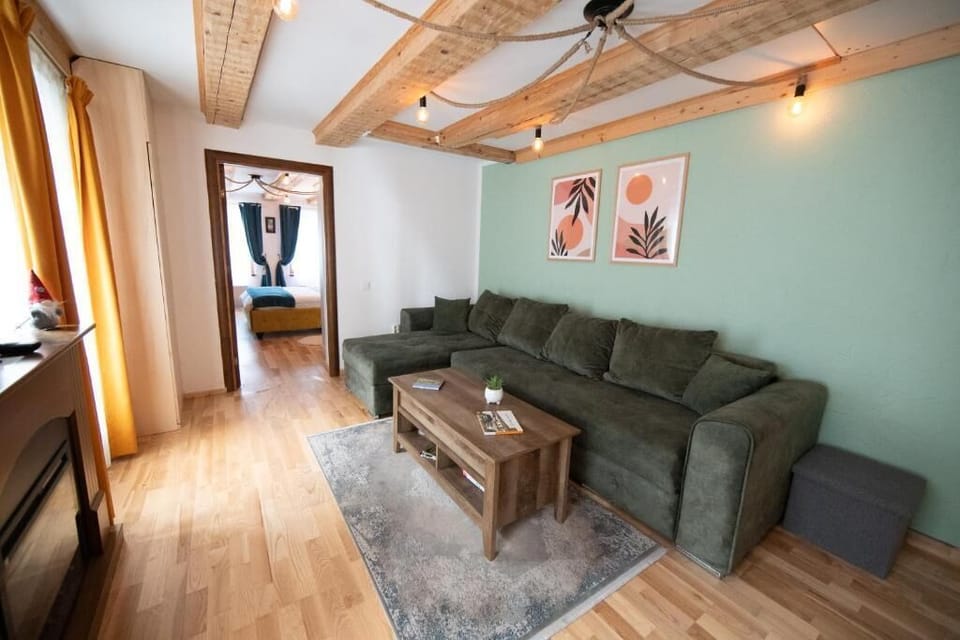 Apartment, Courtyard View | Living area | Flat-screen TV
