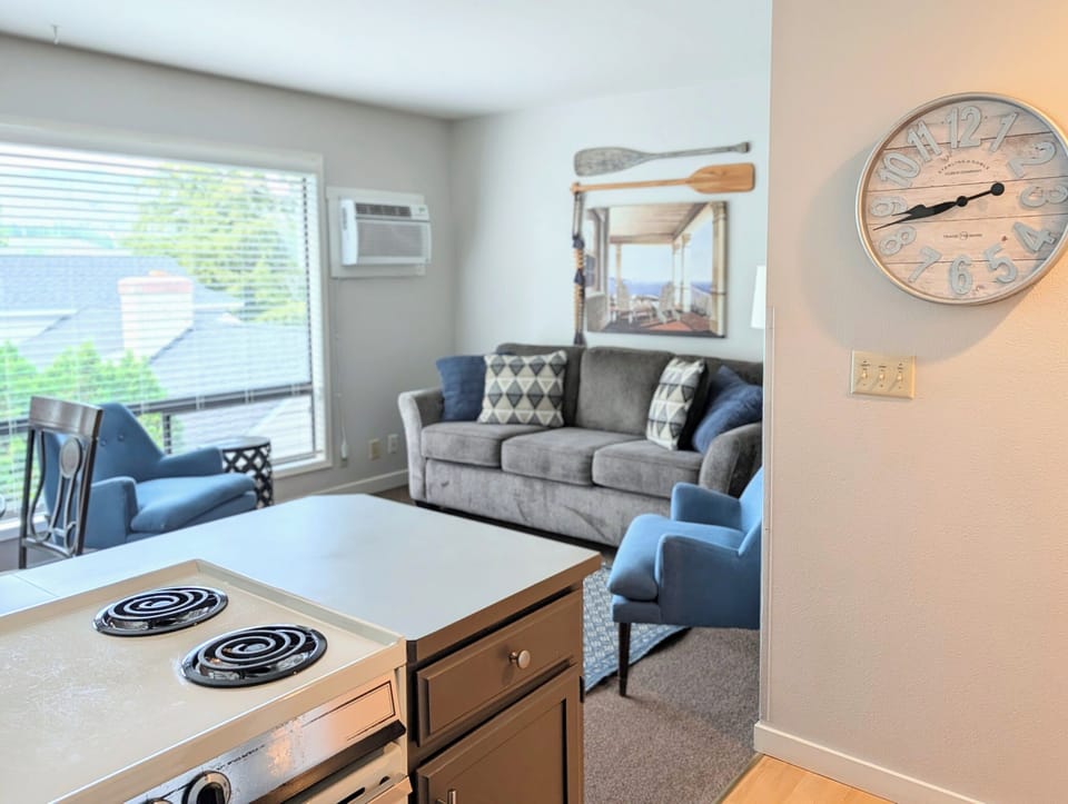 Open concept living, kitchen and dining area for clear sight lines and entertaining.