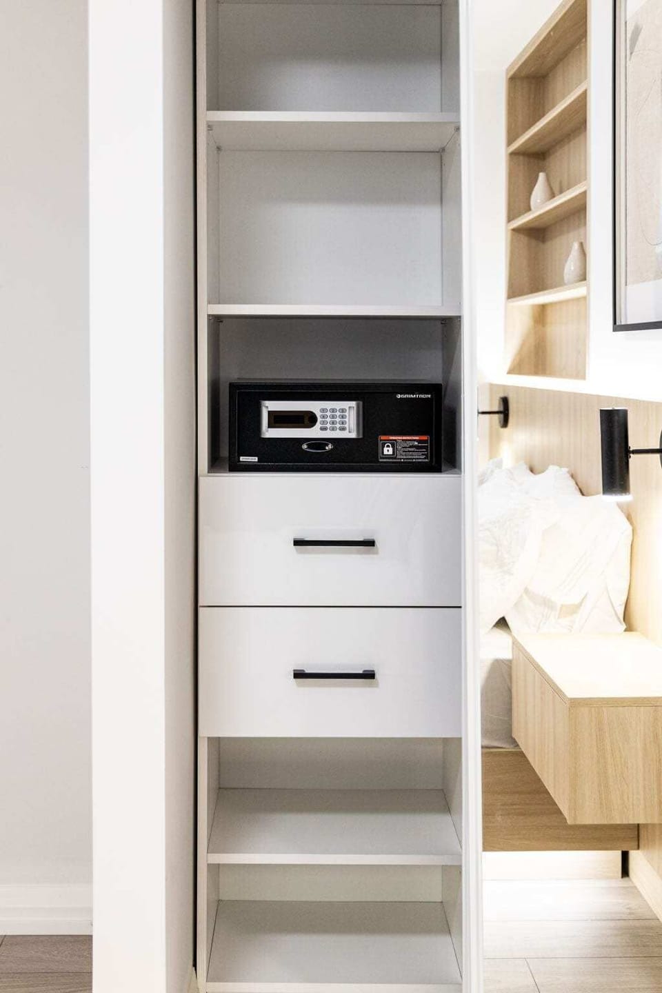 Spacious closet with built-in shelving and ample storage