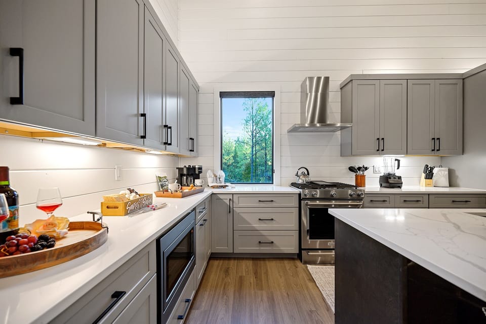 Chef’s kitchen with quartz countertops and premium appliances