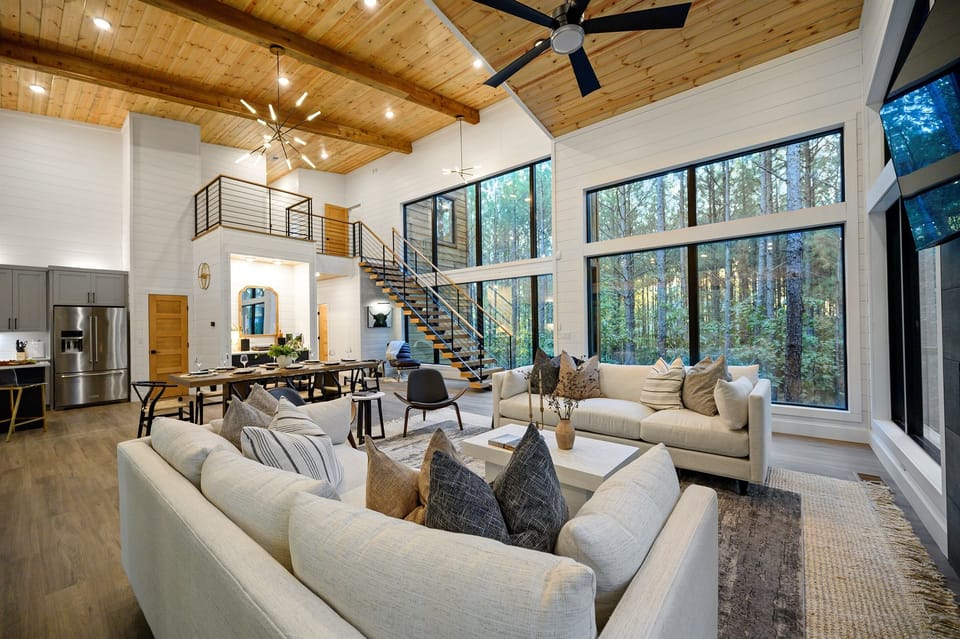 Open-concept living with soaring ceilings and natural light