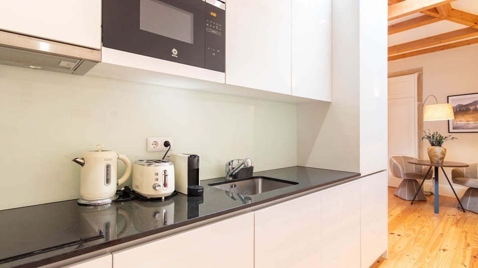 Sleek fully equipped kitchenette designed for effortless stays, whether you’re preparing breakfast before exploring or enjoying a quiet night in.
#LovelyStay #ModernKitchen #BoutiqueApartment