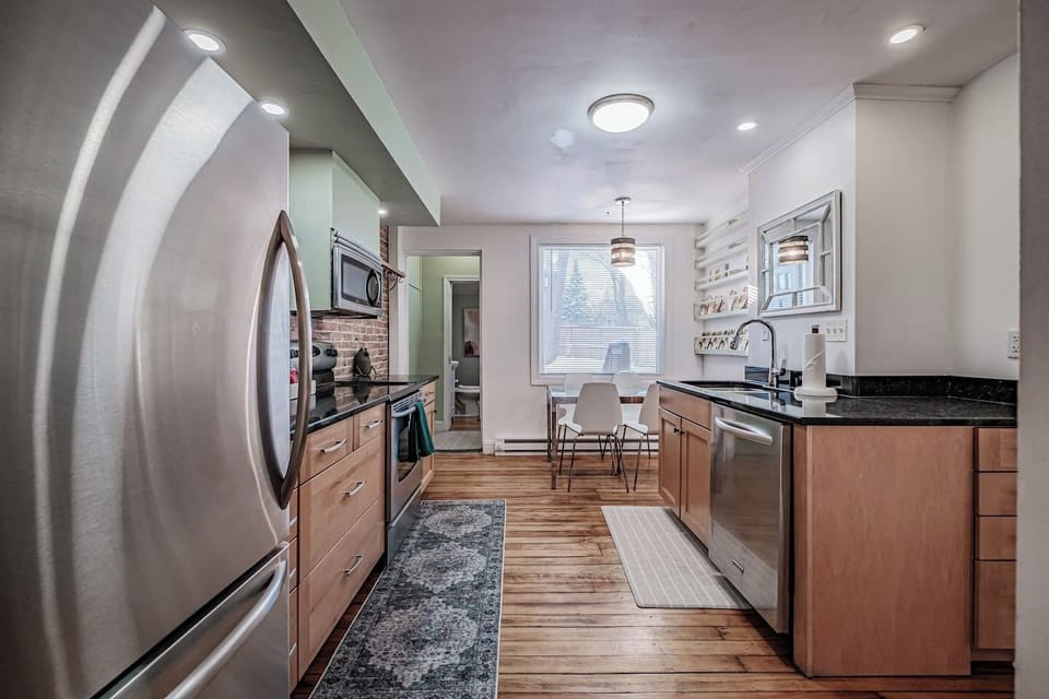Cook with ease in the spacious kitchen, complete with full-size appliances and ample counter space.