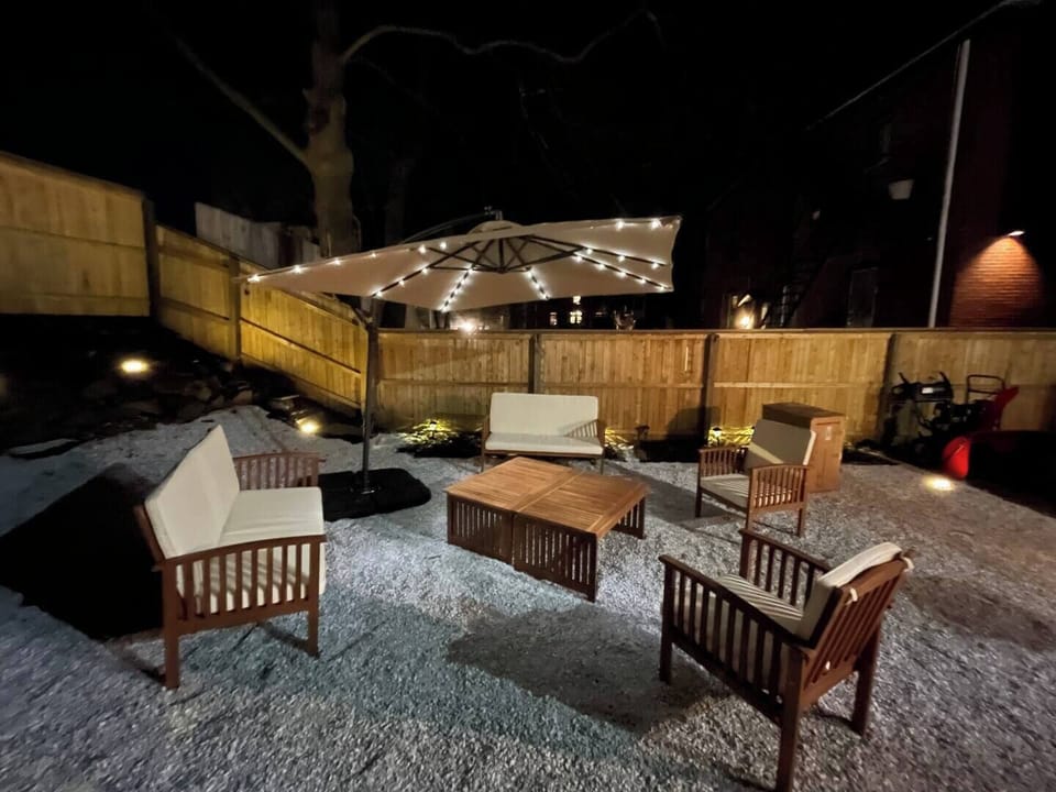 Gather under the string lights in the private backyard for coffee, drinks, or great conversation.