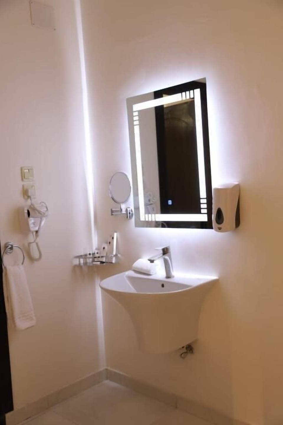Separate tub and shower, rainfall showerhead, designer toiletries