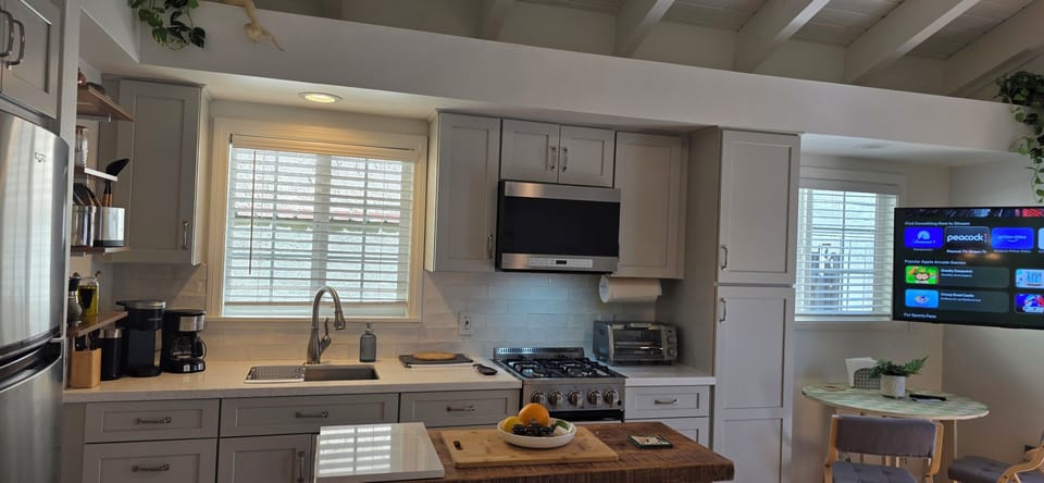 Efficient Kitchen  with Amenities Center Island, Table and 2 Chairs