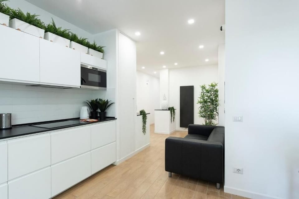 Family Room, Balcony, City View | Private kitchen