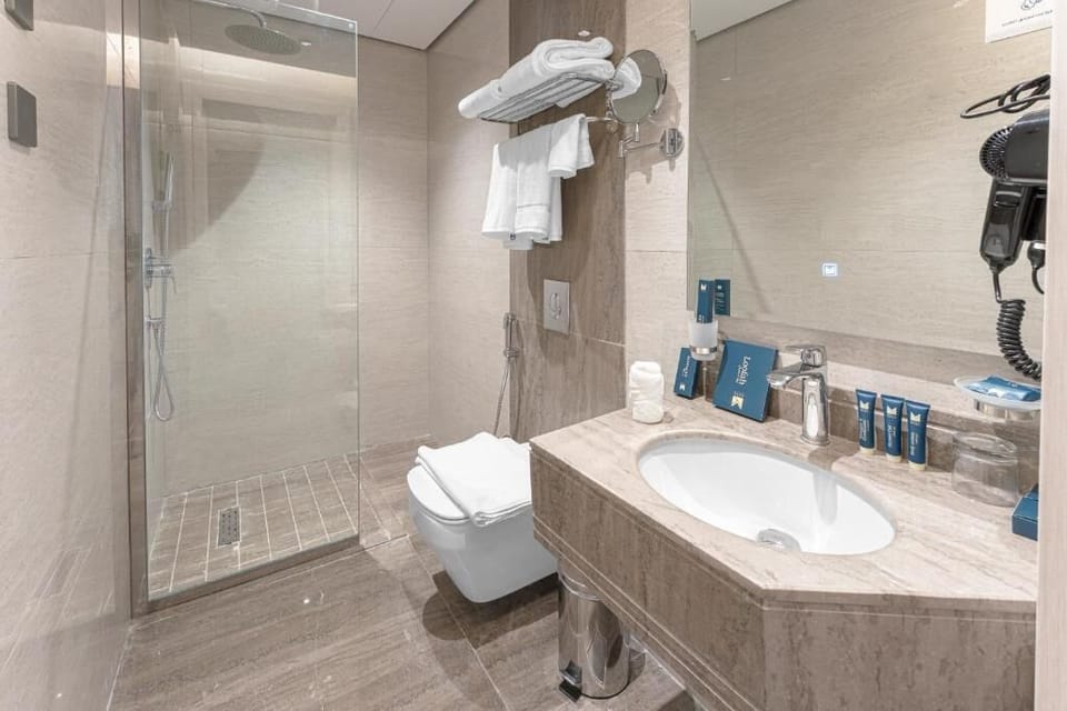 Hair dryer, bathrobes, slippers, bidet