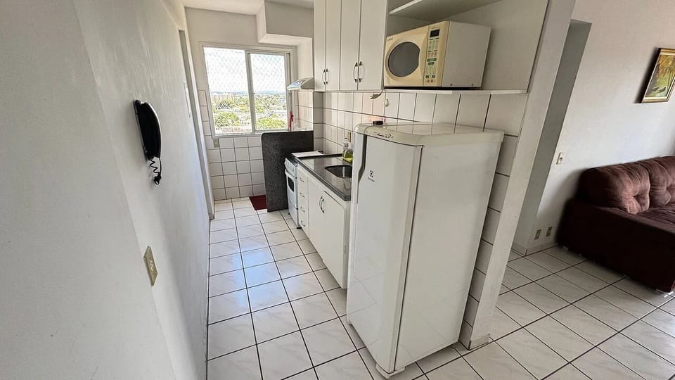Apartment | Private kitchen | Fridge, microwave, stovetop, cookware/dishes/utensils