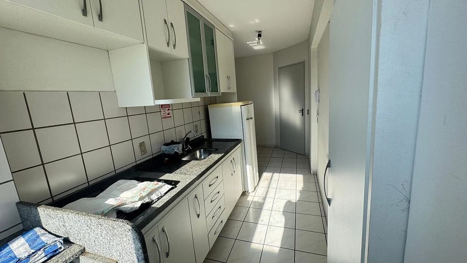 Apartment | Private kitchen | Fridge, microwave, stovetop, cookware/dishes/utensils