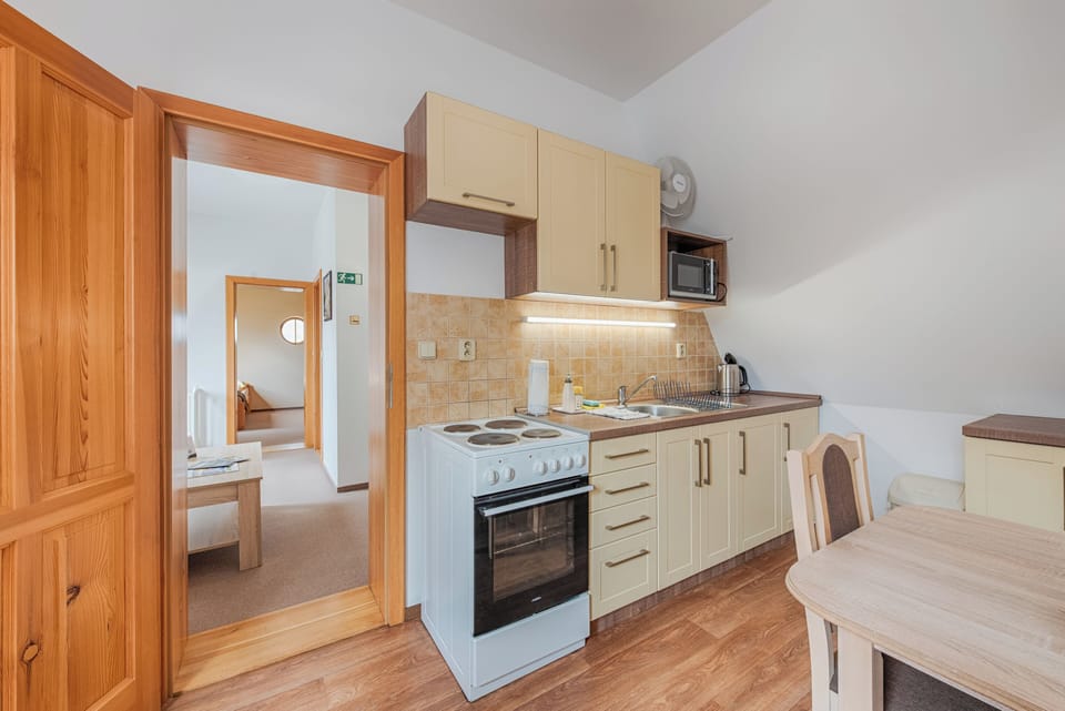 Suite, Kitchen, City View | Private kitchen