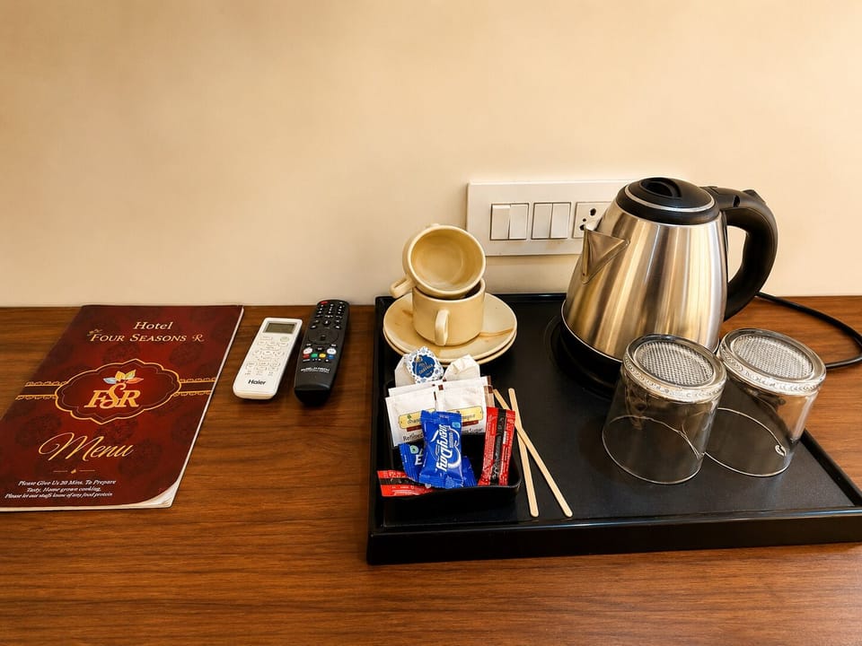Deluxe Room | Coffee and/or coffee maker