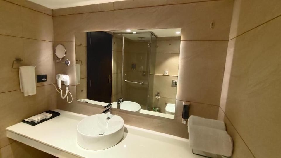 Hair dryer, slippers, towels, soap