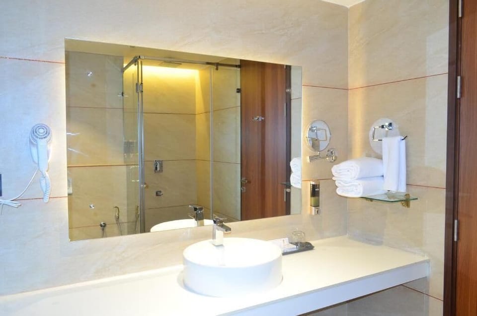 Hair dryer, slippers, towels, soap