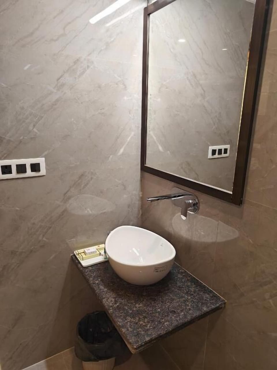 Separate tub and shower, free toiletries, hair dryer, slippers