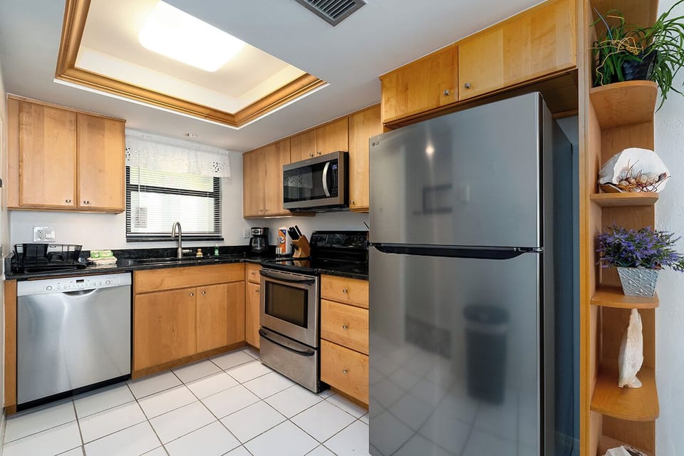 Fully Equipped Kitchen has all the appliances, dishware, cookware and tableware to entertain