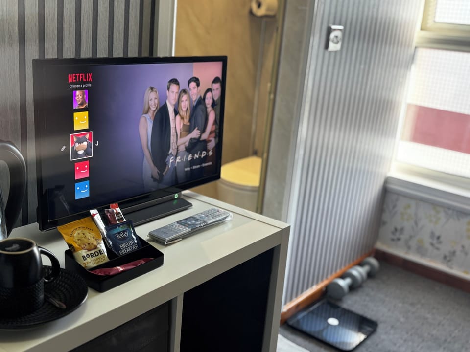 Comfort Suite, Garden View | Television