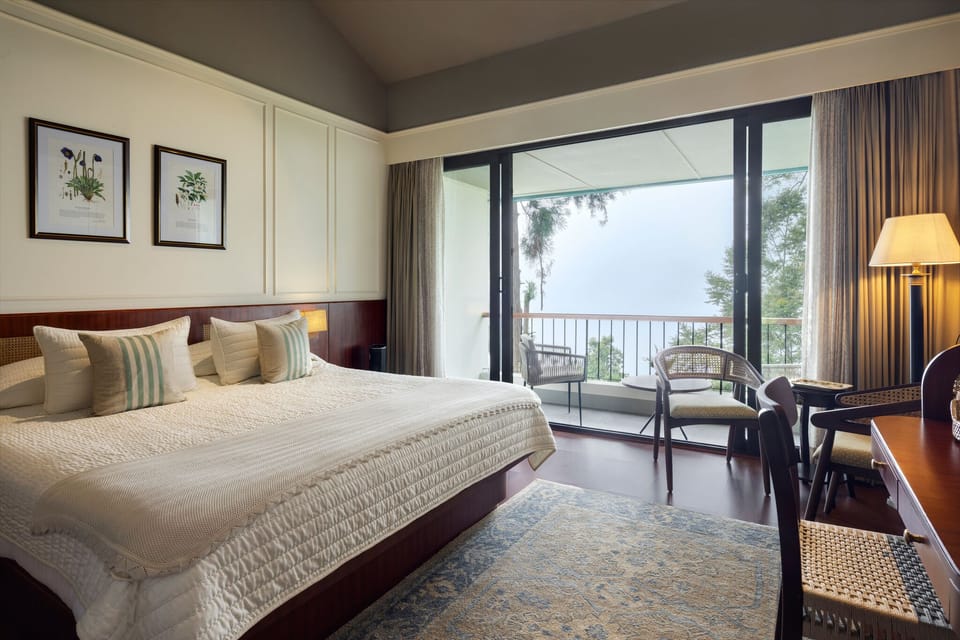 Garden View Room with Balcony | In-room safe, iron/ironing board (on request), WiFi (free), bed sheets