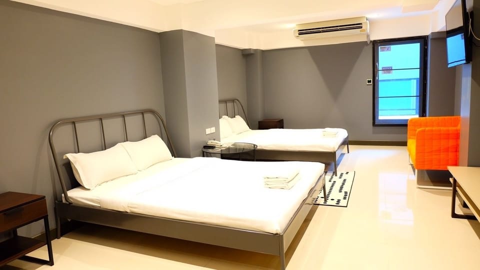 Family Room, 2 Double Beds | In-room safe, desk, WiFi (free), bed sheets