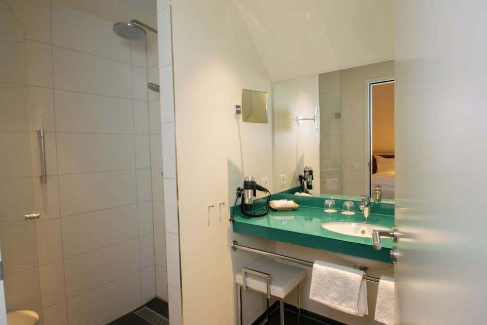 Refresh in a clean ensuite with roomy shower and vanity space