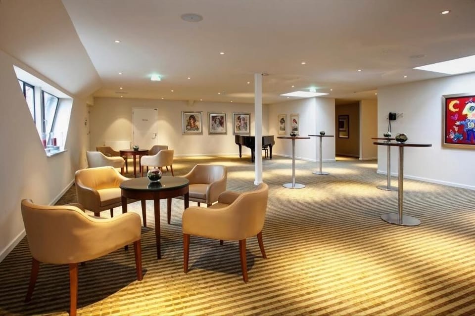 Gather comfortably in the airy lounge for drinks and conversation.