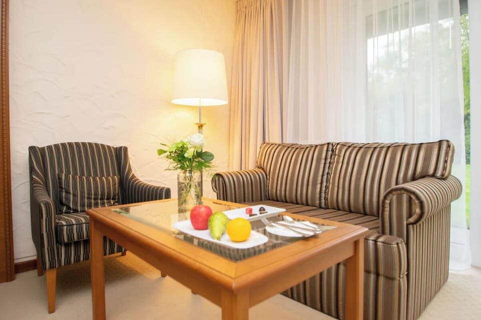 Settle in for a cozy chat beside warm, ambient lighting.