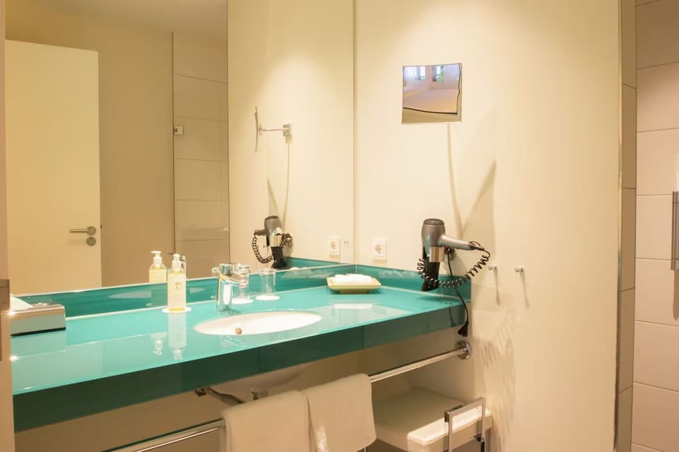 Refresh easily with a bright vanity and generous counter space.