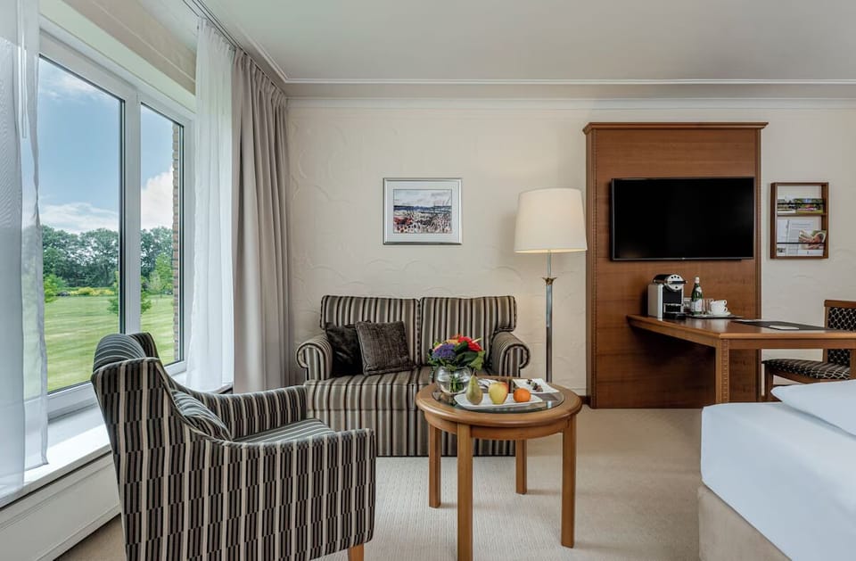 Kick back in the lounge area with coffee and widescreen TV.