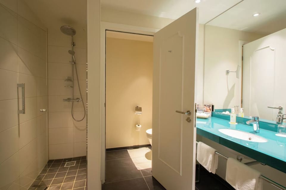 Rinse off in the walk-in shower after a long day.