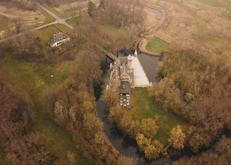 Soar above the private grounds and storybook waterways.