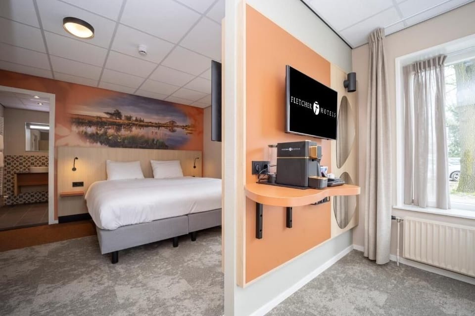Start mornings with in-room coffee and easy TV lounging.