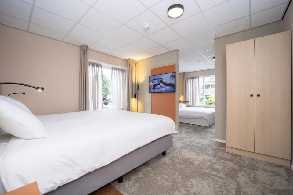 Stretch out with extra sleeping space and a relaxing TV setup.