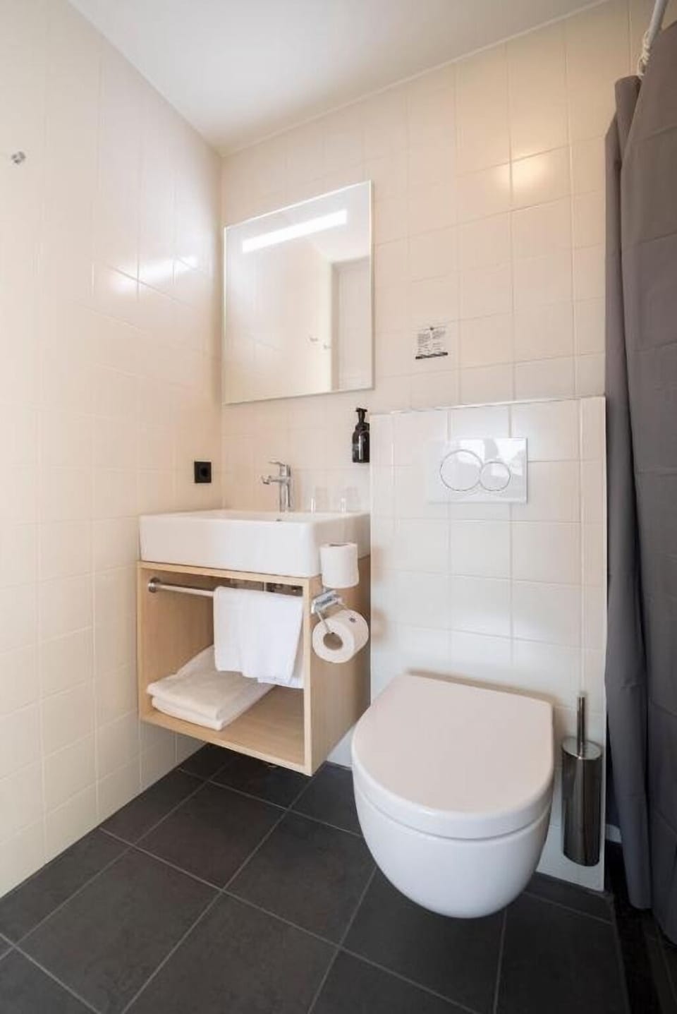 Refresh easily with a spotless modern bath and soft towels.