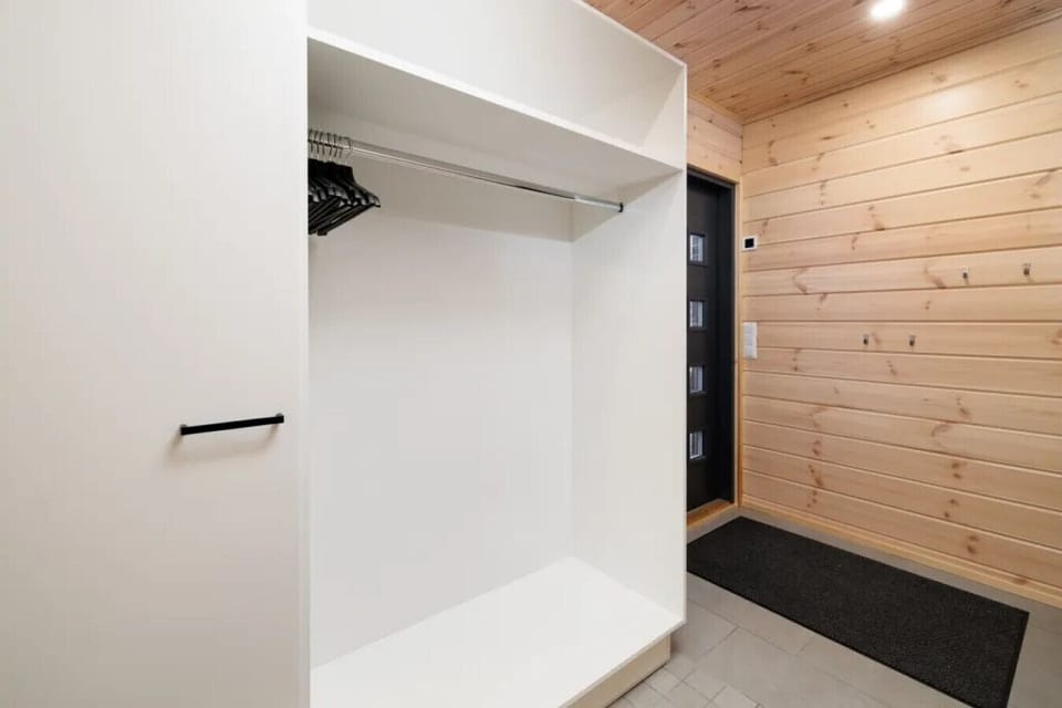 Keep your holiday wardrobe organized with dedicated hanging space and shelving located right by the main entrance.