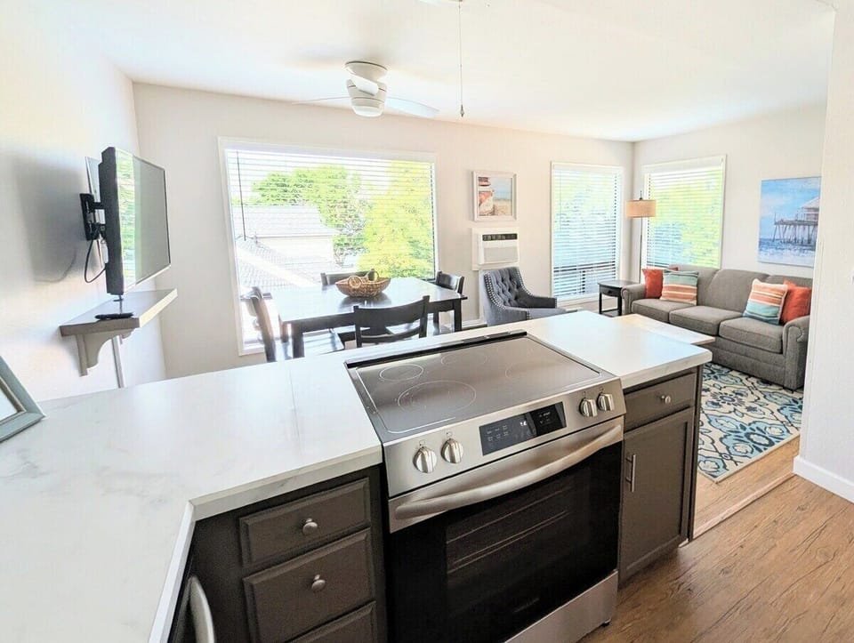 Upgraded kitchen with modern appliances. Open concept layout for easy entertaining, and keeping on eye on the family.