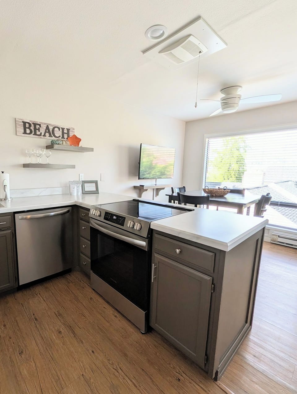 Beautiful remodeled kitchen with upgraded appliances and peek-a-book views while you cook.