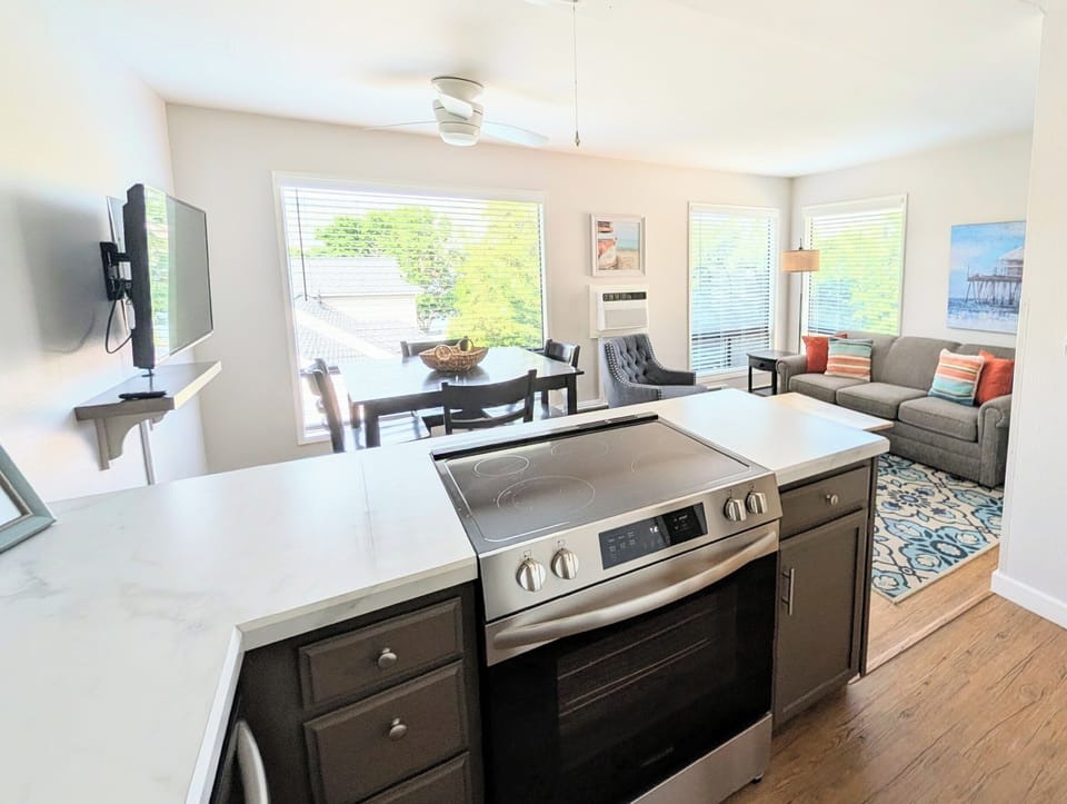 Upgraded kitchen with modern appliances. Open concept layout for easy entertaining, and keeping on eye on the family.