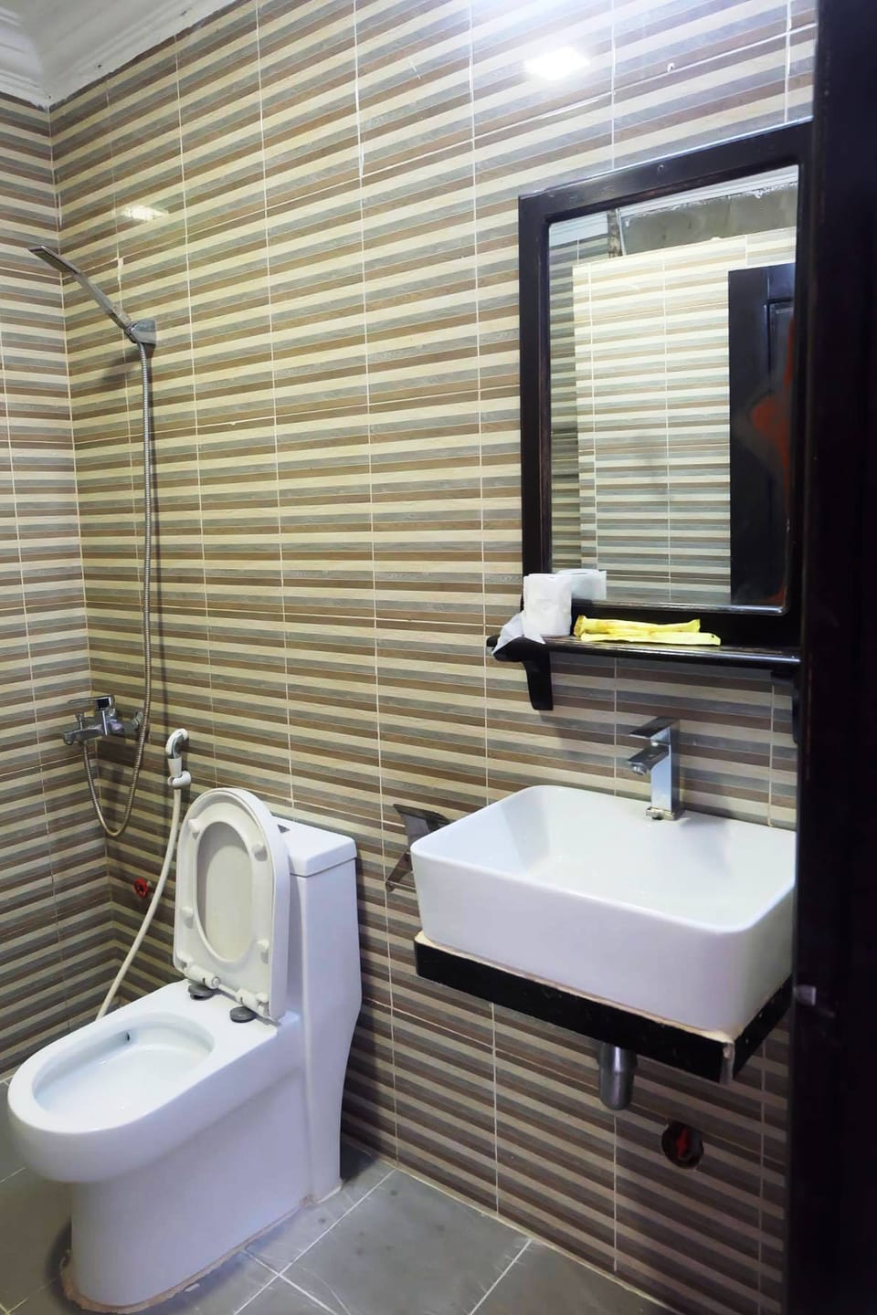 Shower, free toiletries, hair dryer (on request), slippers