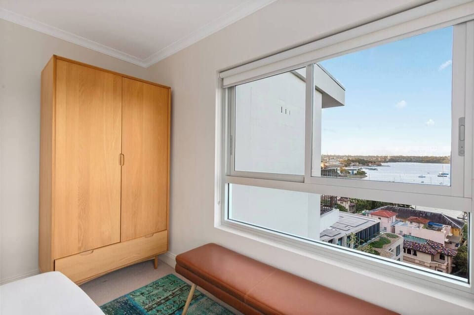 Settle beside the window bench in the third bedroom and take in glimpses across the bay before heading out for nearby waterfront walks.