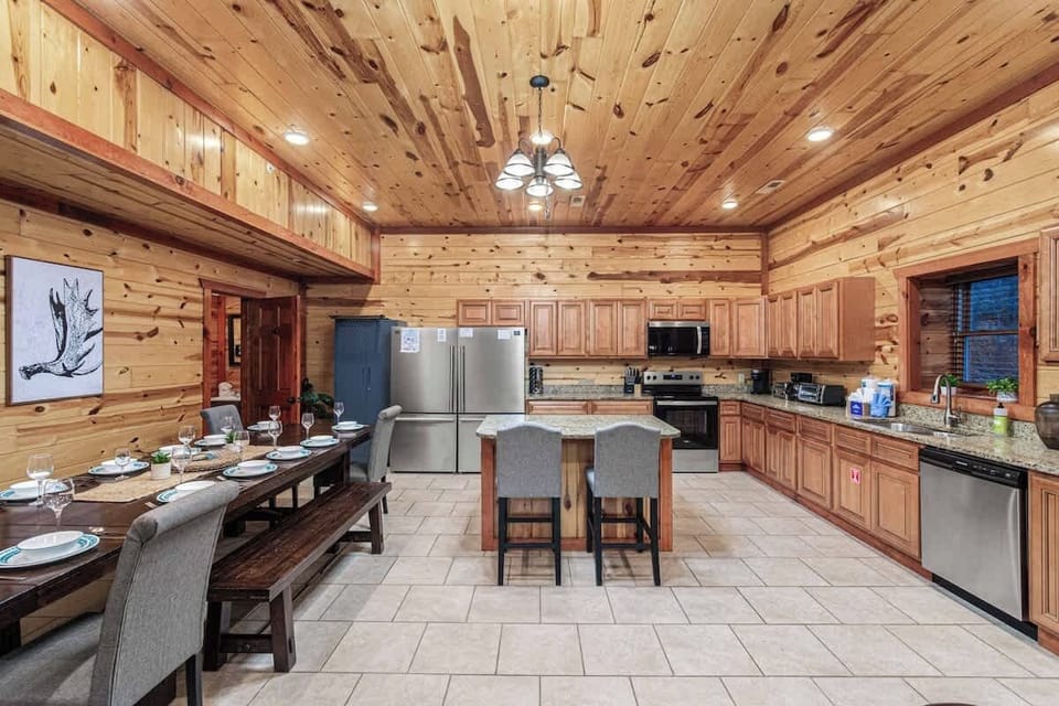 Comfortable seating meets a fully equipped kitchen—perfect for group hangouts, meals, and easy nights in.