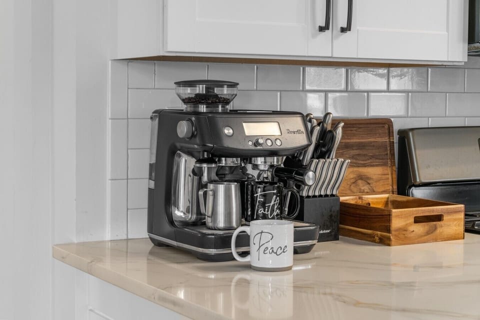 Start your morning with freshly ground coffee or a café-style drink from our automatic Breville espresso machine