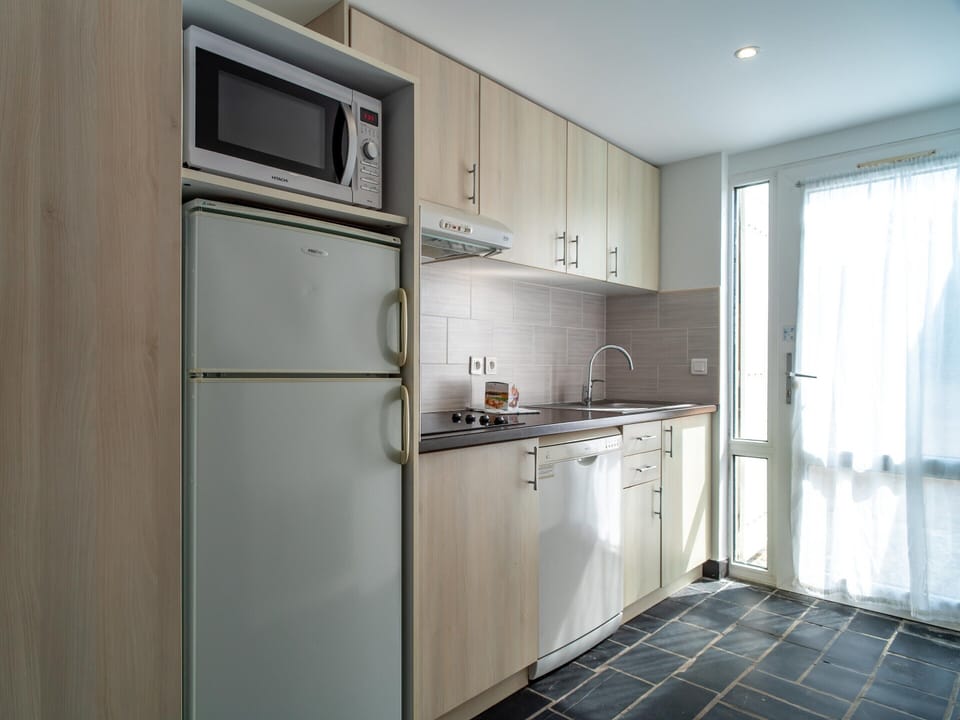 Apartment | Private kitchen | Cleaning supplies
