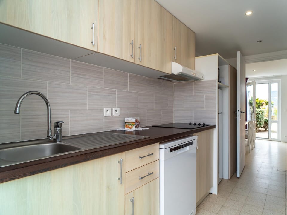 Apartment | Private kitchen | Cleaning supplies