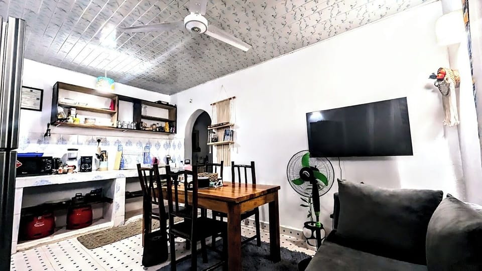 Deluxe House, Garden View | Living area | 32-inch Smart TV with digital channels