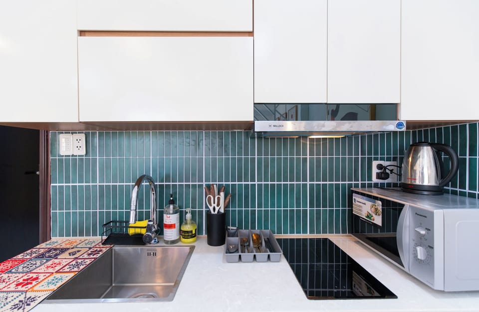 Apartment, 1 Bedroom | Private kitchen | Fridge, microwave, stovetop, highchair